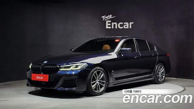 BMW 5-Series 2021 — photo 1