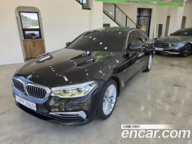 BMW 5-Series 2018 — photo 1