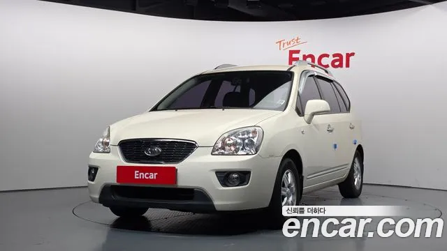 Kia Carens 2011 — photo 1