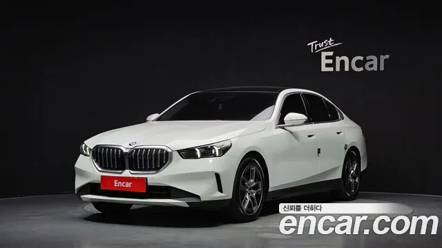 BMW 5-Series 2024 — photo 1