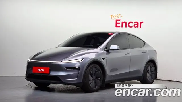 Tesla Model Y 2025 — photo 1