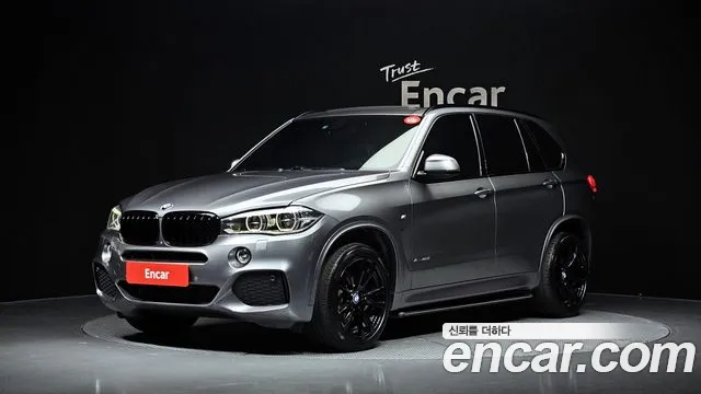 BMW X5 2014 — photo 1