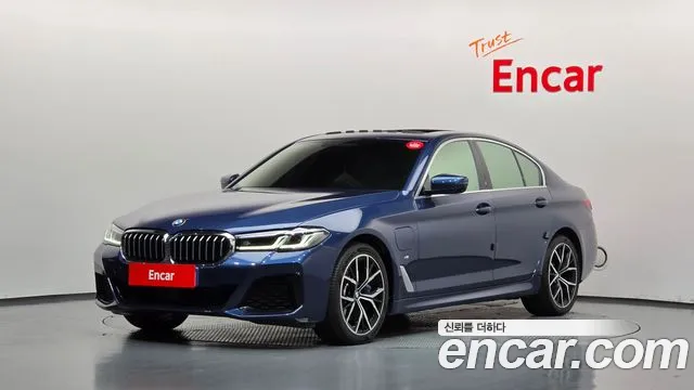 BMW 5-Series 2021 — photo 1