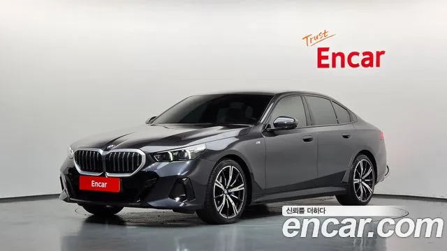 BMW 5-Series 2024 — photo 1