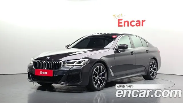 BMW 5-Series 2023 — photo 1