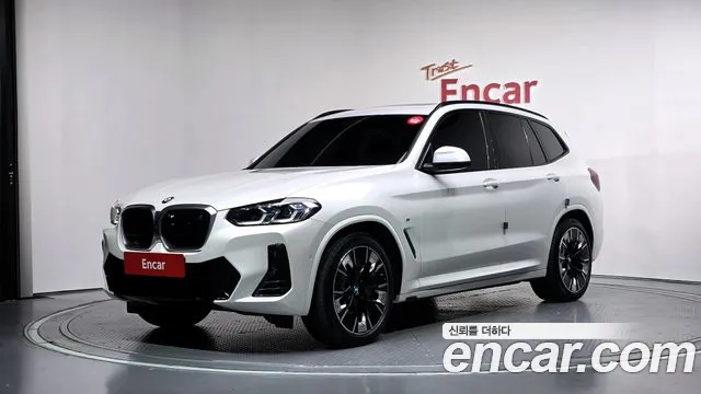 BMW iX3 2024 — photo 1