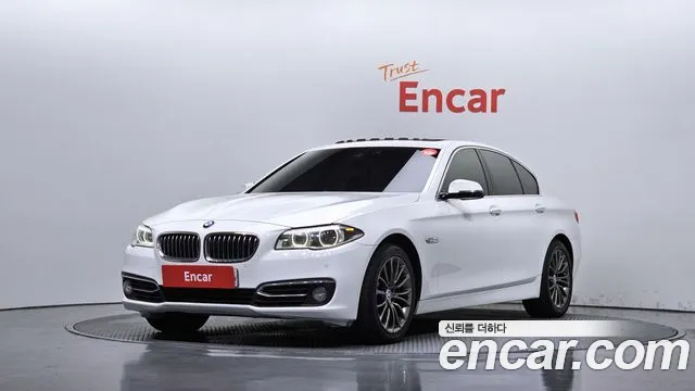 BMW 5-Series 2015 — photo 1