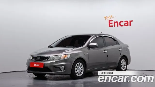 Kia Porte 2010 — photo 1
