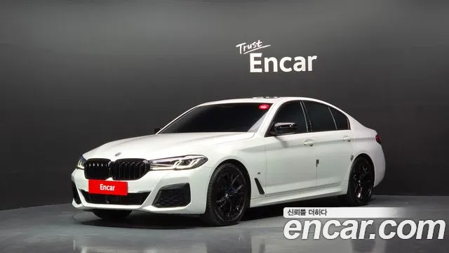 BMW 5-Series 2023 — photo 1