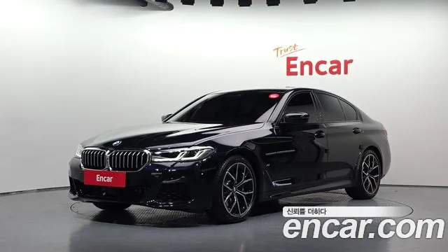 BMW 5-Series 2023 — photo 1
