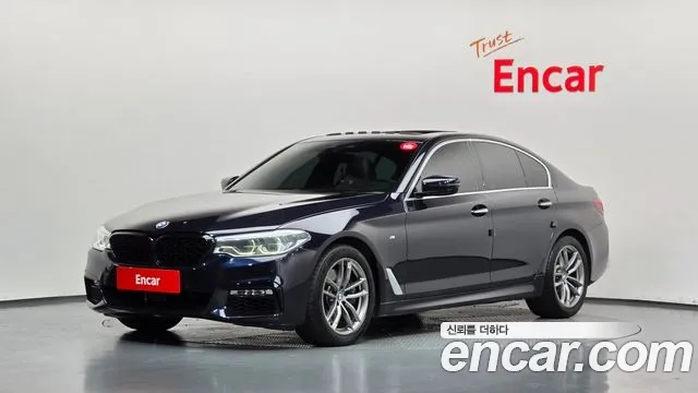 BMW 5-Series 2018 — photo 1