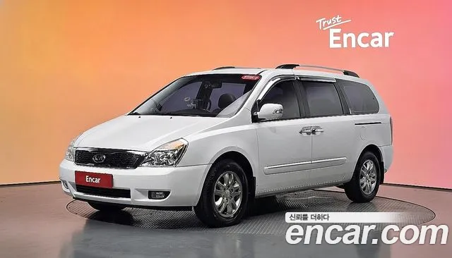 Kia Canival 2012 — photo 1