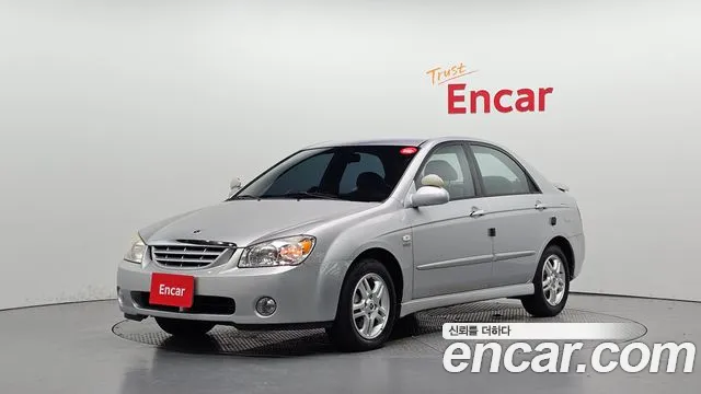 Kia Cerato 2005 — photo 1