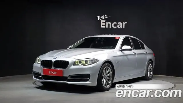 BMW 5-Series 2014 — photo 1