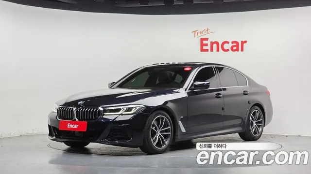 BMW 5-Series 2022 — photo 1