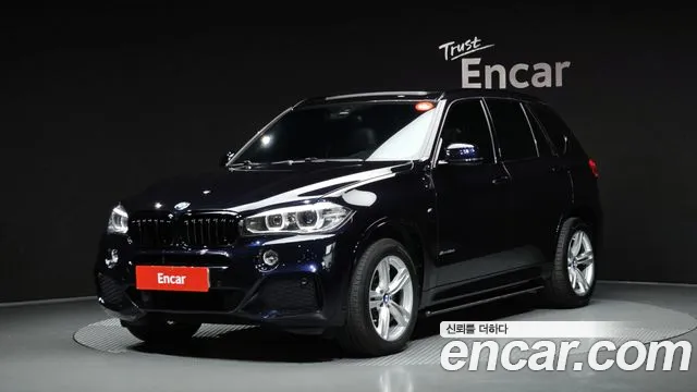BMW X5 2018 — photo 1