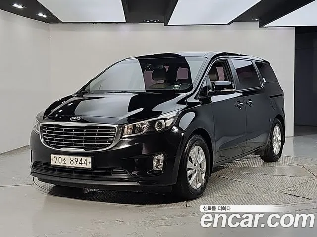 Kia Canival 2015 — photo 1