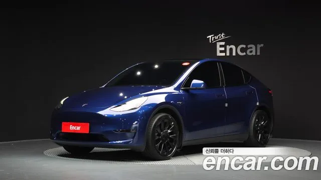 Tesla Model Y 2024 — photo 1