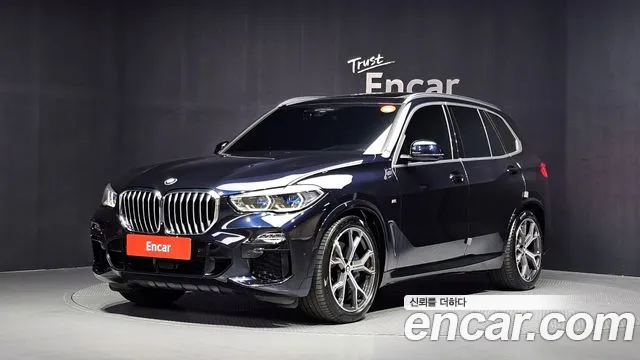 BMW X5 2021 — photo 1