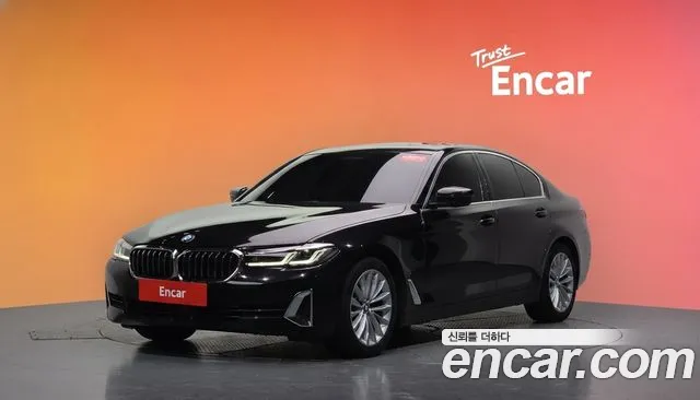 BMW 5-Series 2022 — photo 1