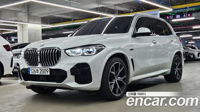 BMW X5 2022 — photo 1