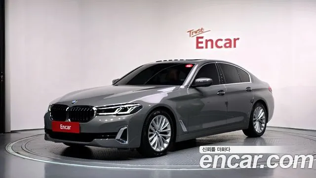 BMW 5-Series 2022 — photo 1