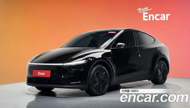 Tesla Model Y 2025 — photo 1