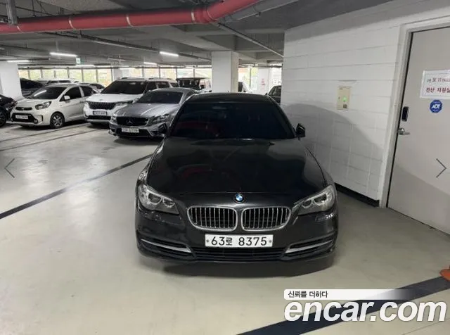 BMW 5-Series 2014 — photo 1