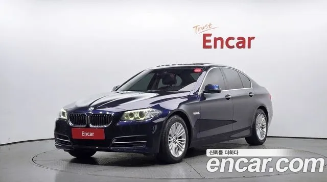 BMW 5-Series 2014 — photo 1