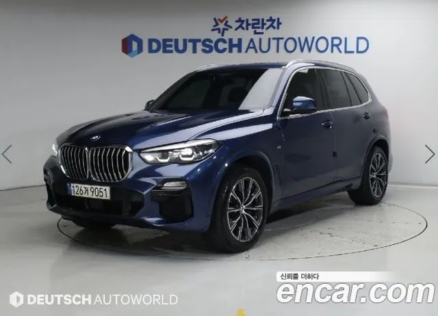 BMW X5 2021 — photo 1