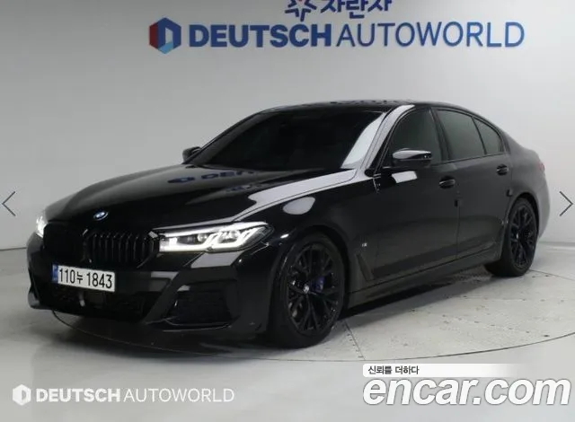 BMW 5-Series 2022 — photo 1