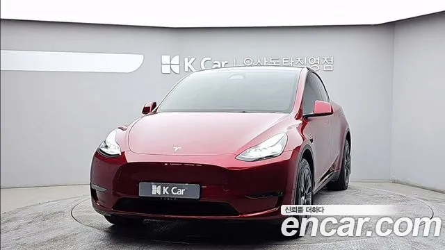 Tesla Model Y 2024 — photo 1