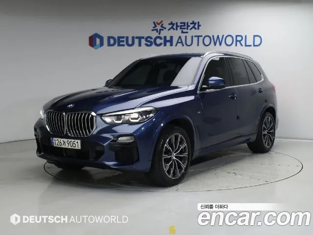 BMW X5 2021 — photo 1