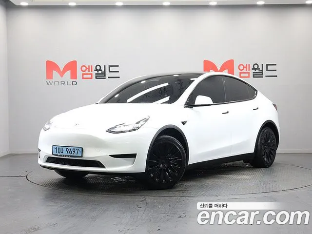 Tesla Model Y 2023 — photo 1