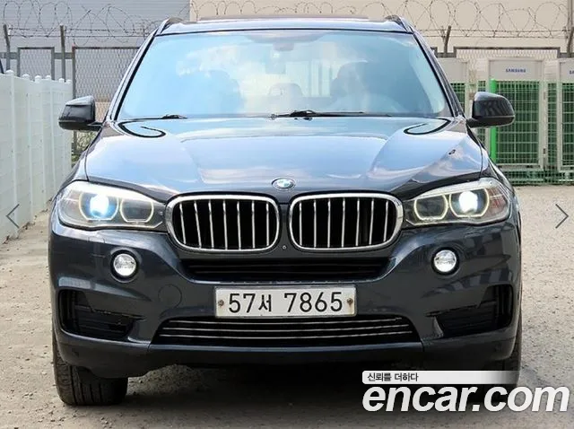 BMW X5 2014 — photo 1