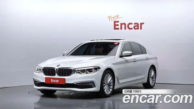 BMW 5-Series 2018 — photo 1