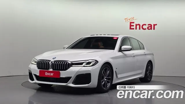 BMW 5-Series 2023 — photo 1