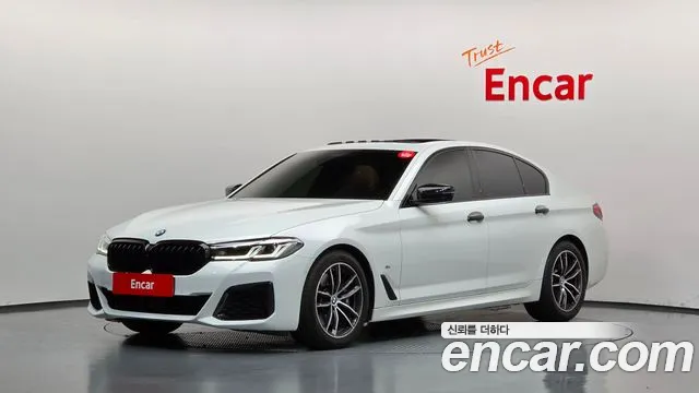 BMW 5-Series 2023 — photo 1
