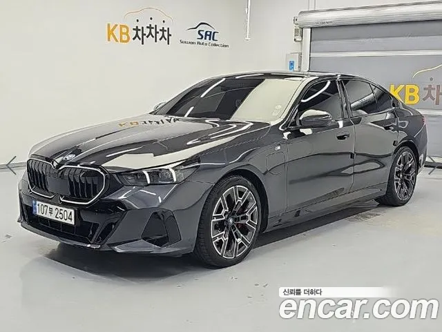 BMW 5-Series 2024 — photo 1