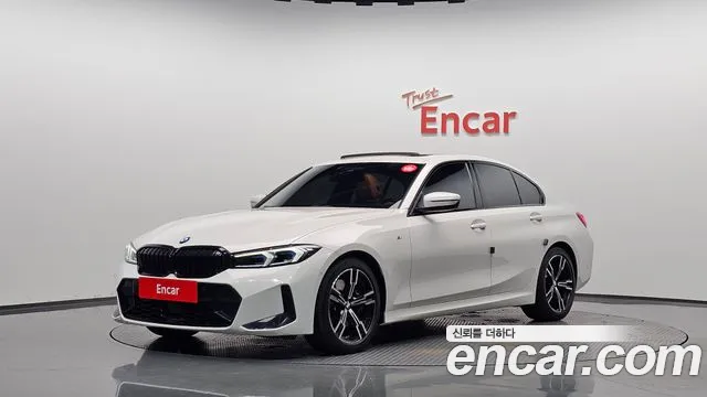 BMW 3-Series 2023 — photo 1