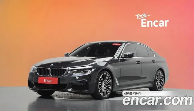 BMW 5-Series 2019 — photo 1