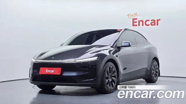 Tesla Model Y 2025 — photo 1