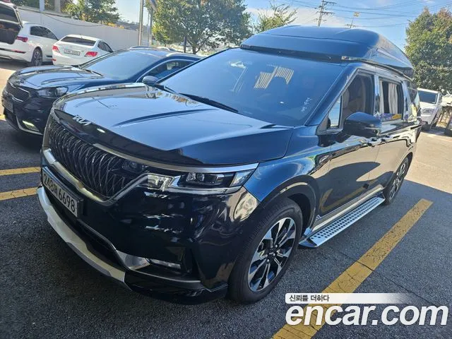 Kia Canival 2023 — photo 1