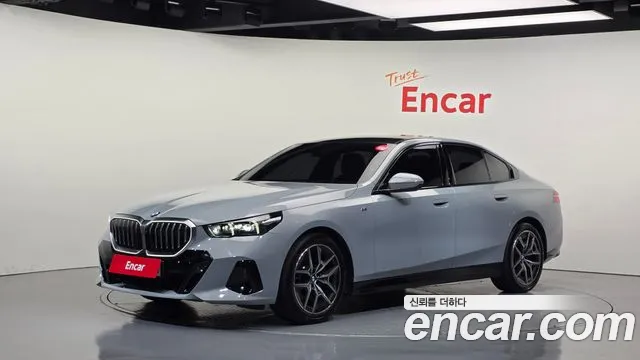 BMW 5-Series 2024 — photo 1