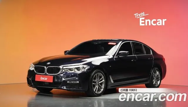BMW 5-Series 2018 — photo 1