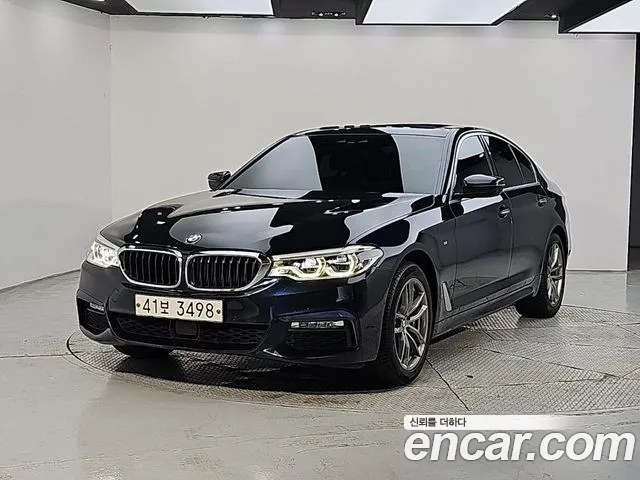 BMW 5-Series 2018 — photo 1