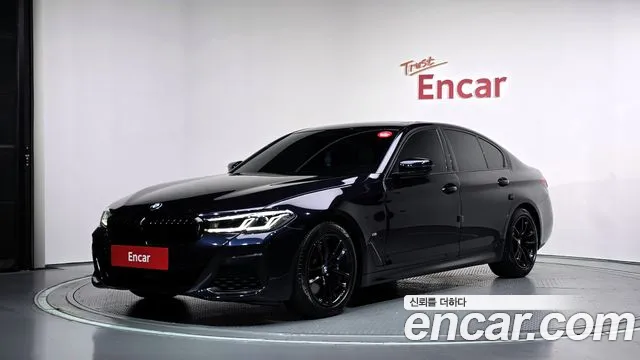 BMW 5-Series 2021 — photo 1