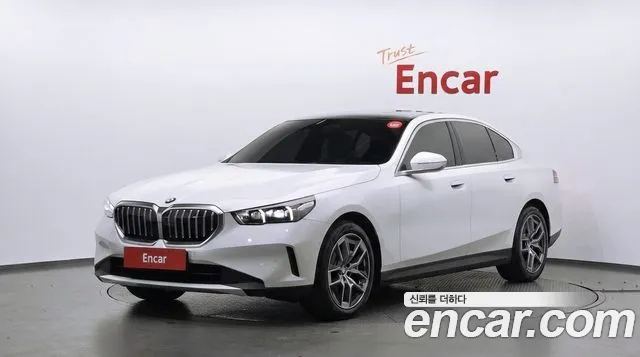 BMW 5-Series 2024 — photo 1