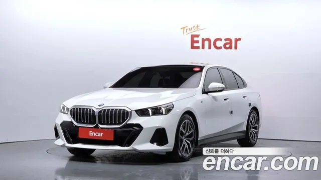 BMW 5-Series 2024 — photo 1