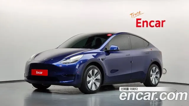 Tesla Model Y 2023 — photo 1